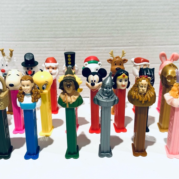 Colorful Holiday PEZ Dispensers Featuring Santa Reindeer and Snowman - Picture 1 of 4